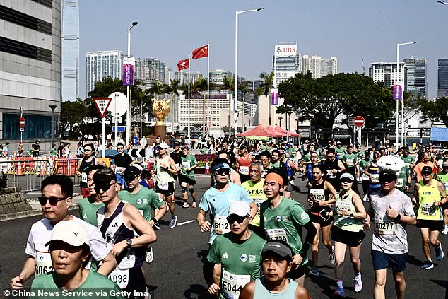 Exclusive: Shocking Incident at Standard Chartered Hong Kong Marathon 2026 – Man Seen Running with Baby Strapped to Chest