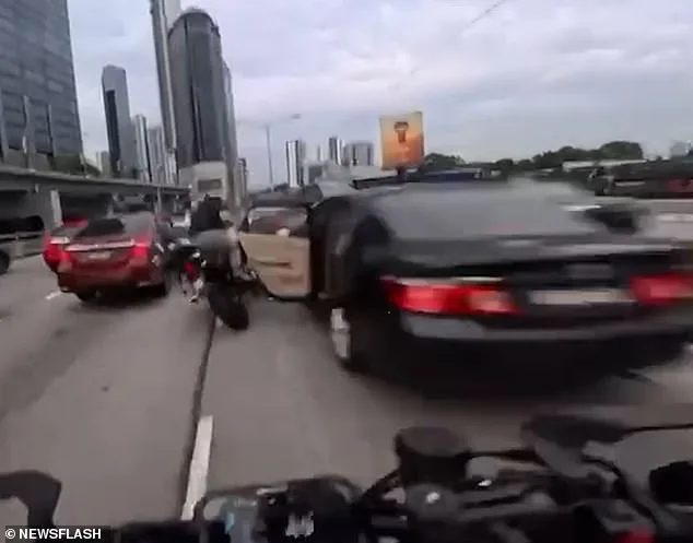 Child's Open Door Sparks Devastating Crash on Kuala Lumpur Motorway