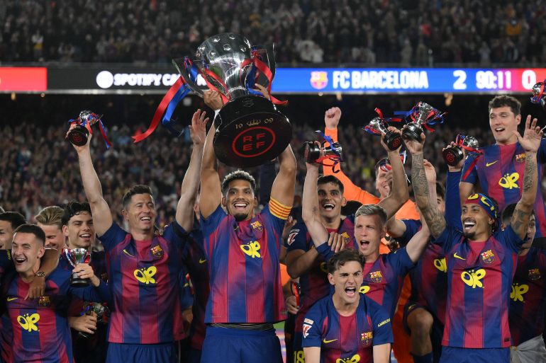 Barcelona clinch La Liga title with historic 2-0 El Clasico victory.